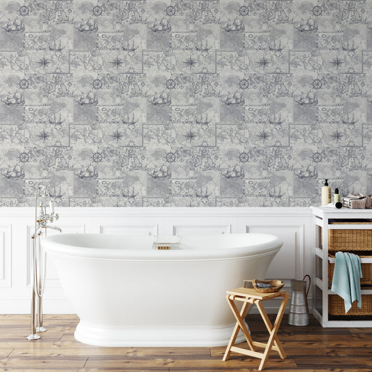 Bathroom with a white freestanding bathtub, wooden stool, and decorative wallpaper.