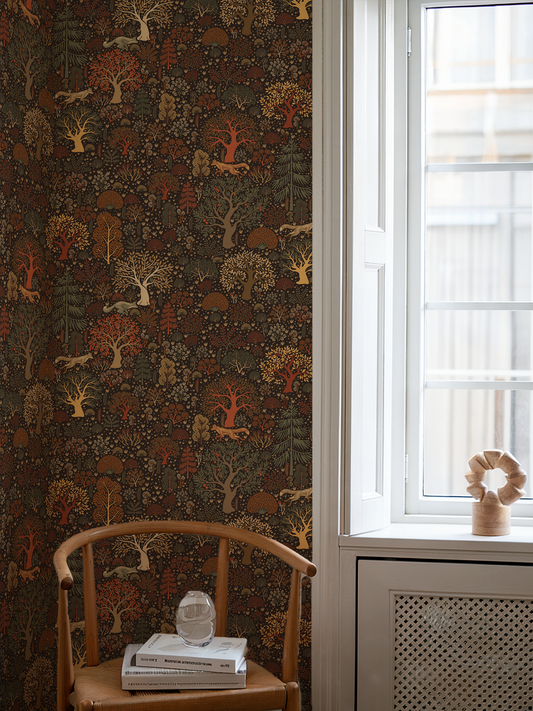 Room interior with patterned wallpaper, wooden chair, and window.