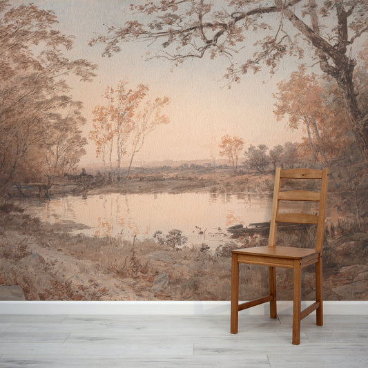 Wooden chair in front of a scenic wall mural with trees and a lake.