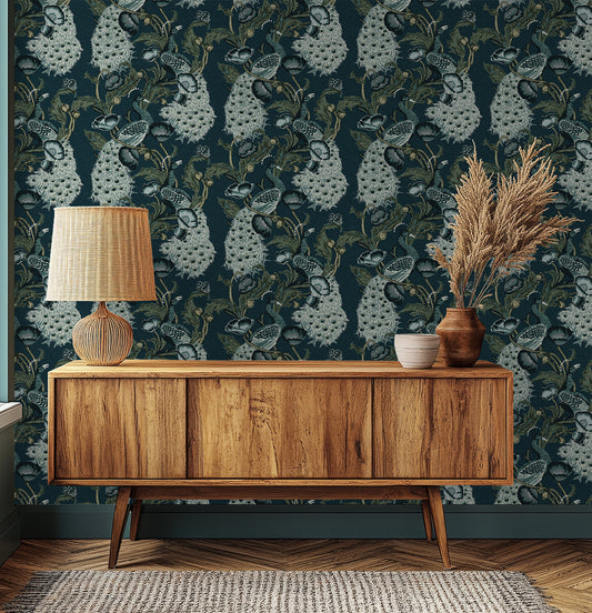 Wooden sideboard against a decorative wall with peacock pattern