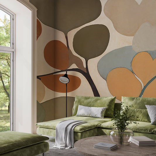 Modern living room with green sofa, abstract wall art, and a window view.