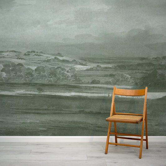 Vintage watercolour landscape painting mural with a wicker chair