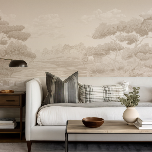 Living room with a white sofa, side table, and coffee table against a wall with cloud wallpaper.