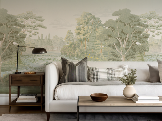 Living room with a large wall mural of trees and landscape.