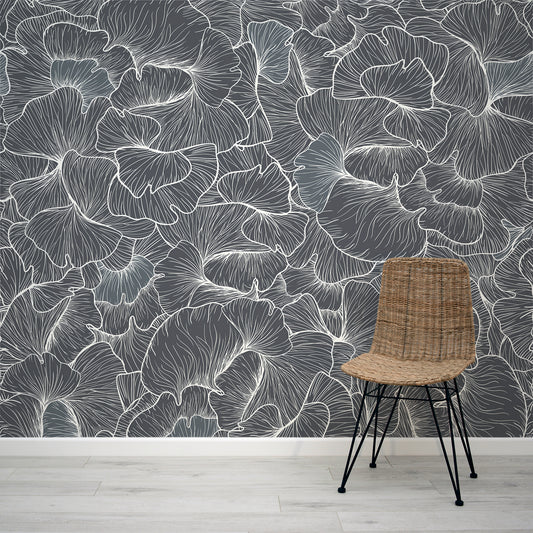 Chanterelle Wallpaper with a Chair in front of a wall with a navy floral pattern