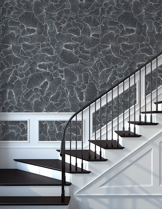 Chanterelle Wallpaper with a Staircase with black railing against a detailed floral wall.