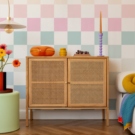Checkmate Pastel in colourful living room with cabinet and flowers