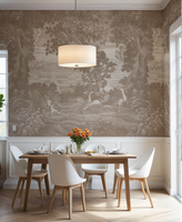 Dining room with wooden table and white chairs against a decorative wall.