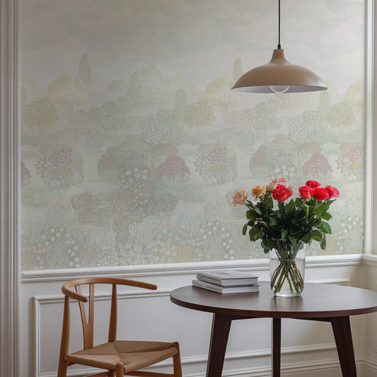 Dining room with a round wooden table, vase of flowers, and patterned wallpaper.