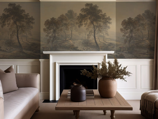 Living room with a fireplace and wall mural of trees