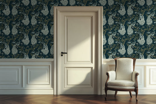 Room interior with floral peacock wallpaper, white door, and armchair.