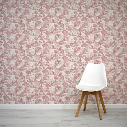 Pastel toile inspired wallpaper with a white chair 