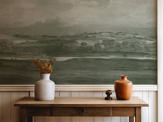 Vintage Landscape painting mural in a hallway with a table and vases 