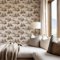 Living room with patterned wallpaper, sofa, and window view