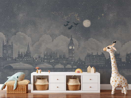 Watercolour London skyline Peter Pan inspired mural in a children's play room with a stuffed giraffe 