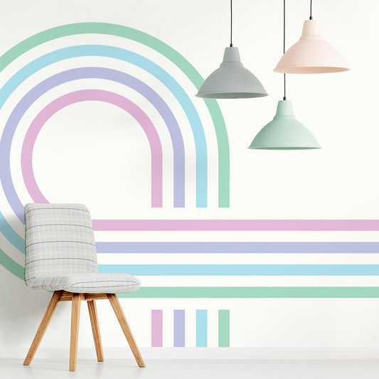 Retro Spiral Mural Pastel in living room with grey fabric covered chair with pastel ceiling lights hanging down