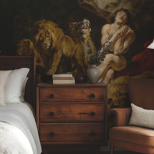 Royal in bedroom with wooden drawers and brown armchair 