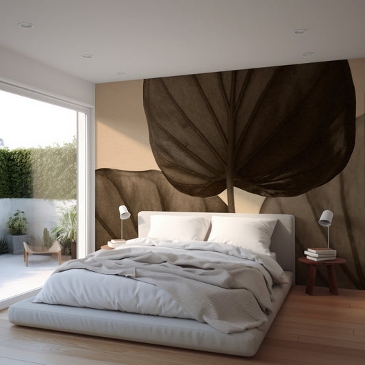 Modern bedroom with a large leaf-mural and a bed.