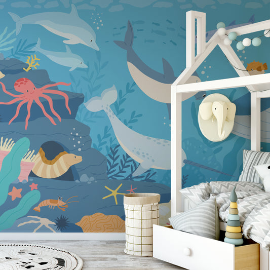 Submerged Fantasia Original wallpaper in child's bedroom with big bed with zigzag grey bedding and elephant shaped clothes hanger