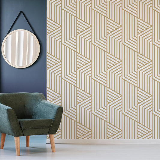 Gold Art Deco wallpaper mural with a comfy chair and picture on the wall | WallpaperMural.com